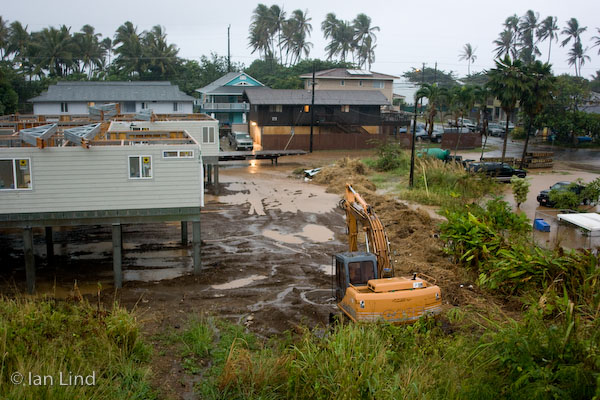 Flooding along the end of Kekio Road behind the post office is obvious from this vantage point on Lihimauna Road. Note the new steel-frame homes going up.