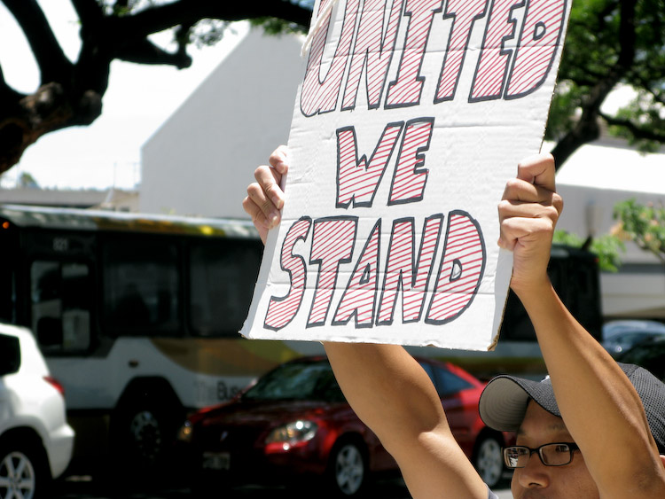 Advertiser employees rally